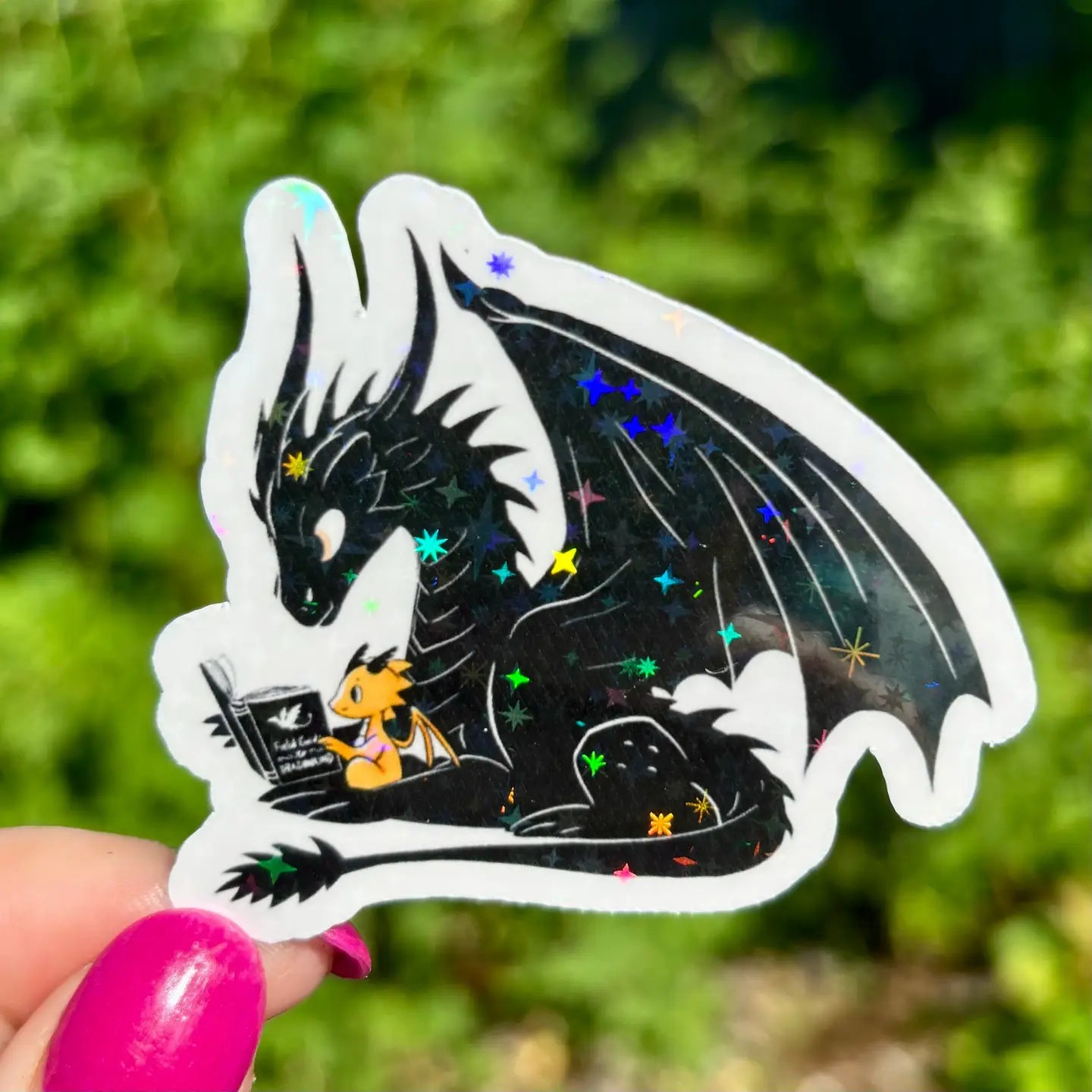 AN - Dragons Reading Field Guide To Dragon Kind Sparkle Sticker