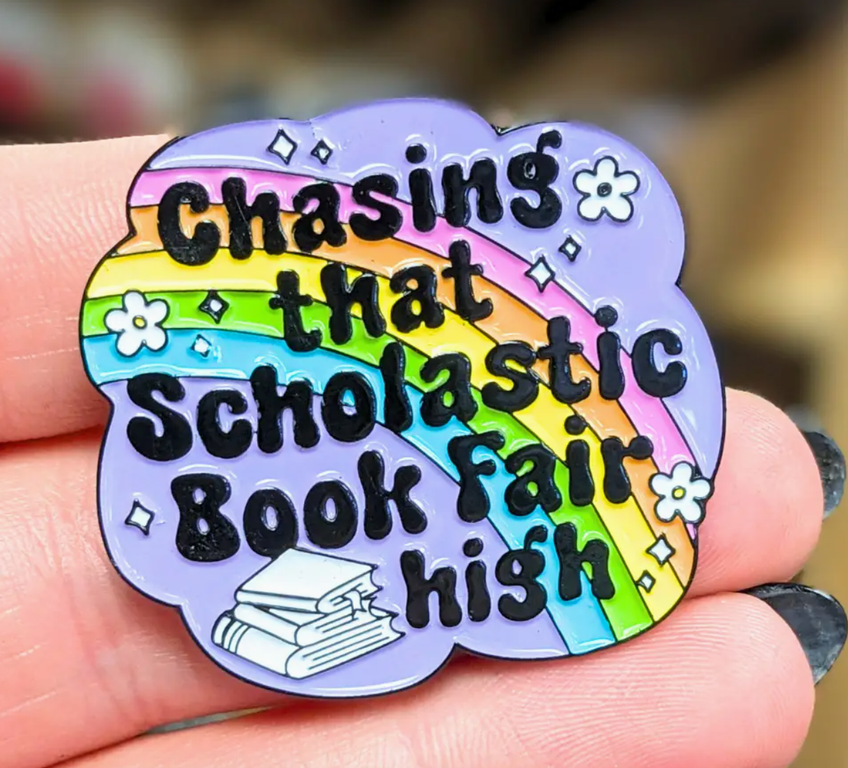 IM - Chasing That Scholastic Book Fair High Enamel Pin