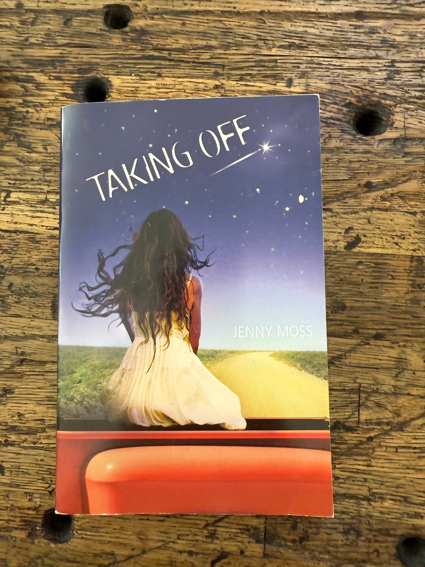 Taking Off - mg,used