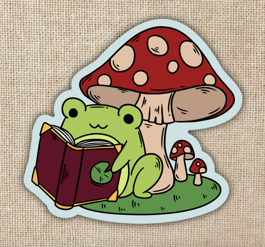 WE - Frog Reading Under Toadstool Sticker